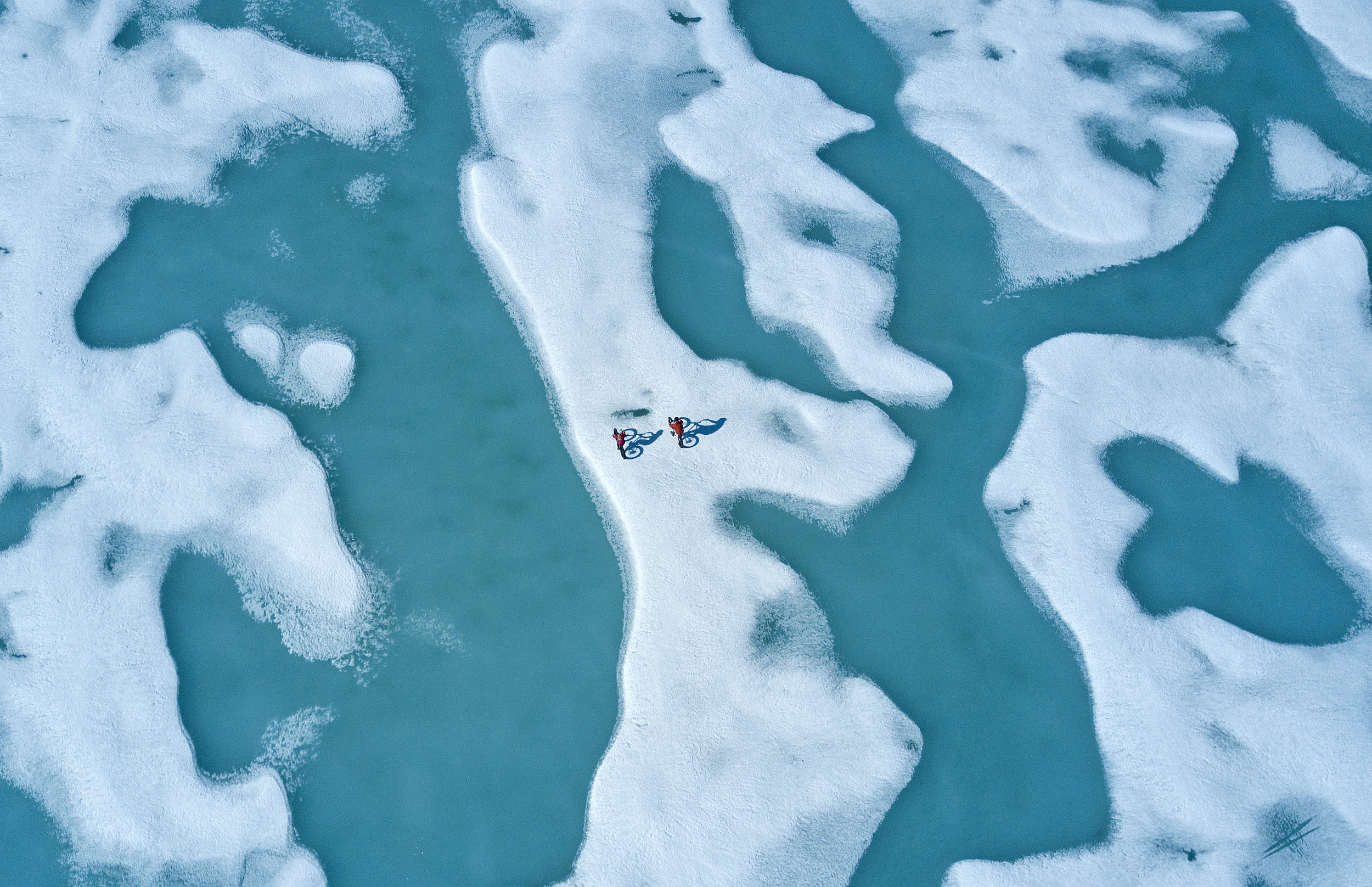 Arctic Biking in Cunningham Inlet on the sea ice near Arctic Watch